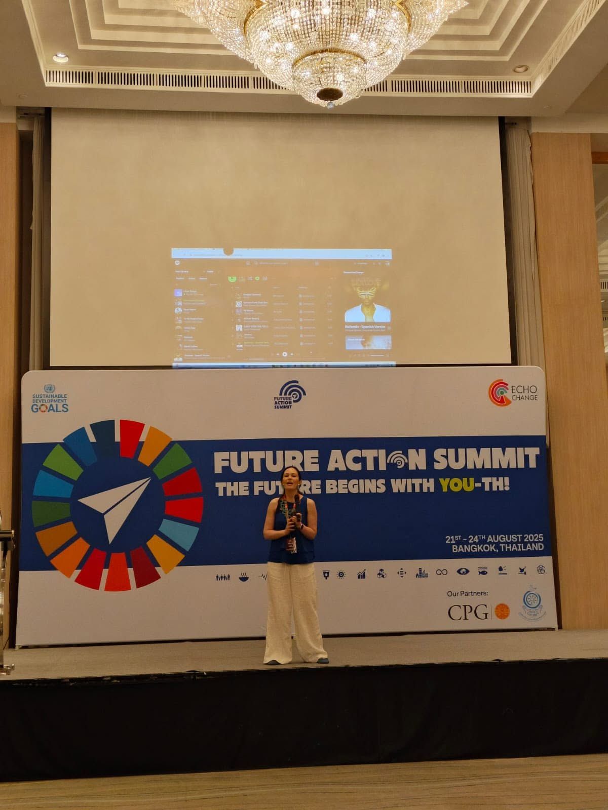 Speaker on stage at the Future Action Summit