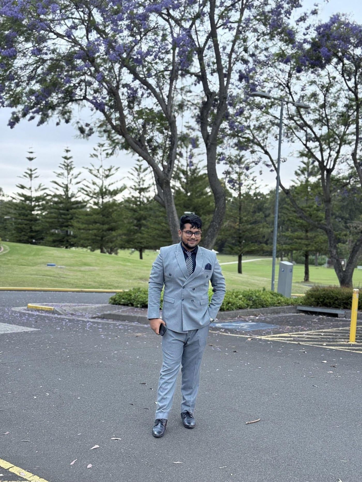 Fahim standing in a park in Sydney